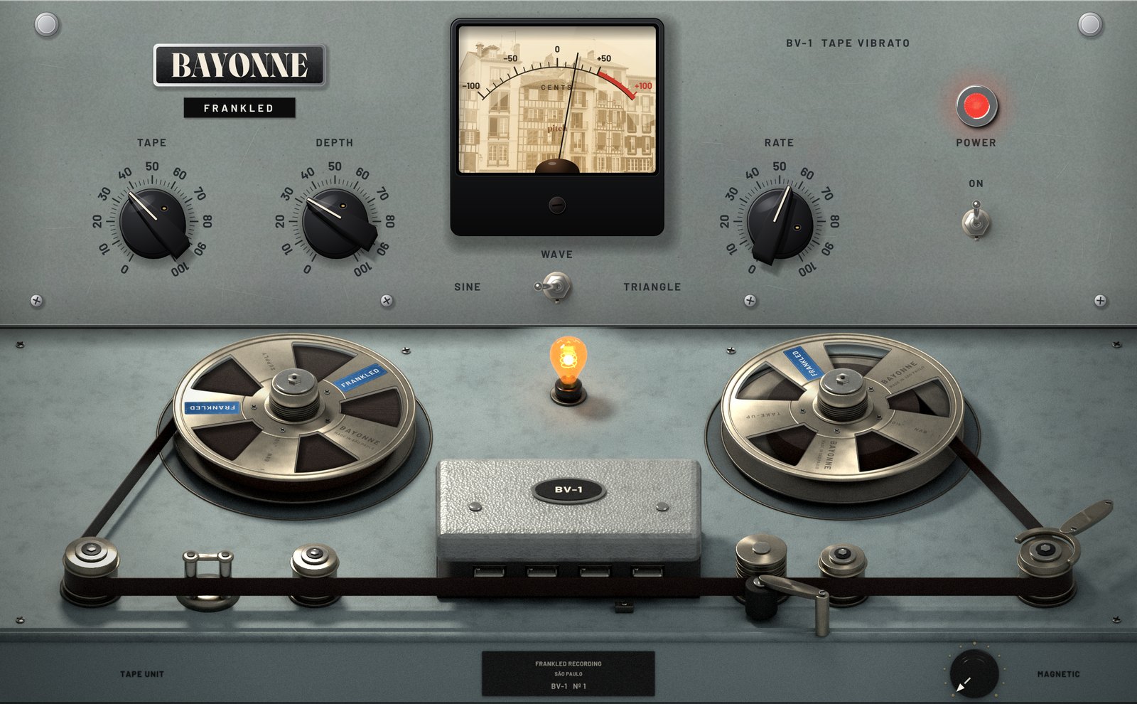 The BV-1 Tape Vibrato plugin: a grey-green painted rack panel with Tape, Depth and Rate knobs, a pitch meter showing a photo of Bayonne, a red power lamp, and a reel-to-reel tape unit below.